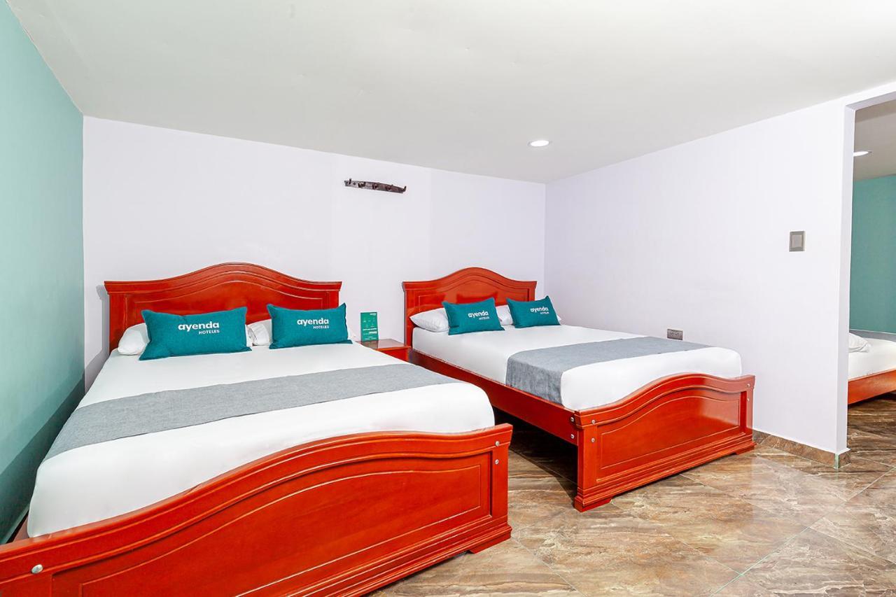 Ayenda Onix Suite Pasto Bagian luar foto